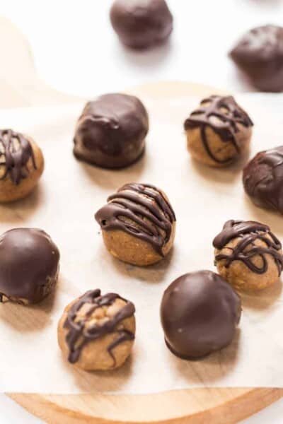 ALMOND BUTTER TRUFFLES made with just 4 ingredients: almond butter, maple syrup, coconut flour and chocolate!