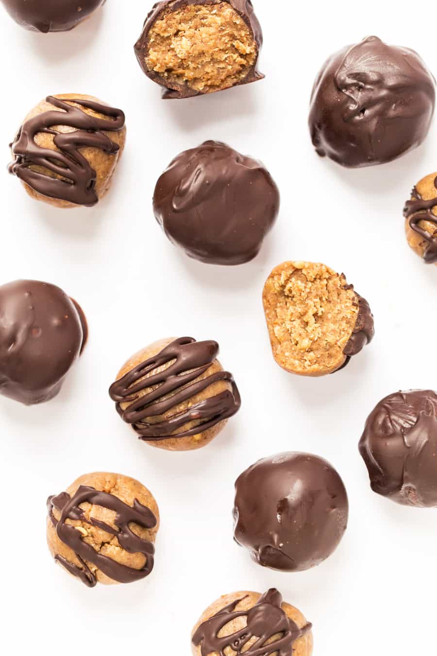 ALMOND BUTTER TRUFFLES made with just 4 ingredients: almond butter, maple syrup, coconut flour and chocolate!