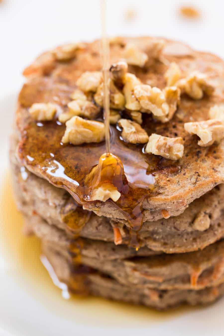 Healthy Carrot Cake Pancakes with maple syrup