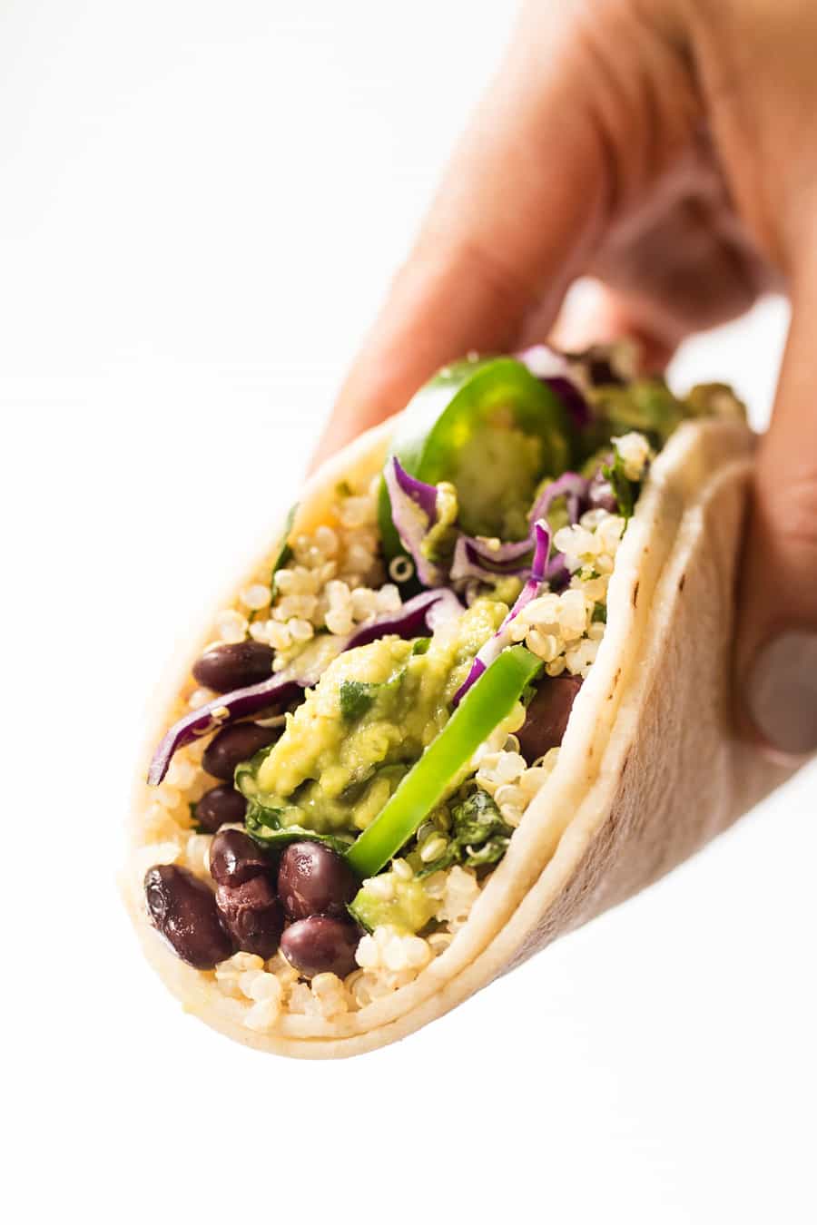 These healthy Cilantro Lime Black Bean Quinoa Tacos are the PERFECT recipe for summer! Light, flavorful, healthy and super SIMPLE! [vegan]
