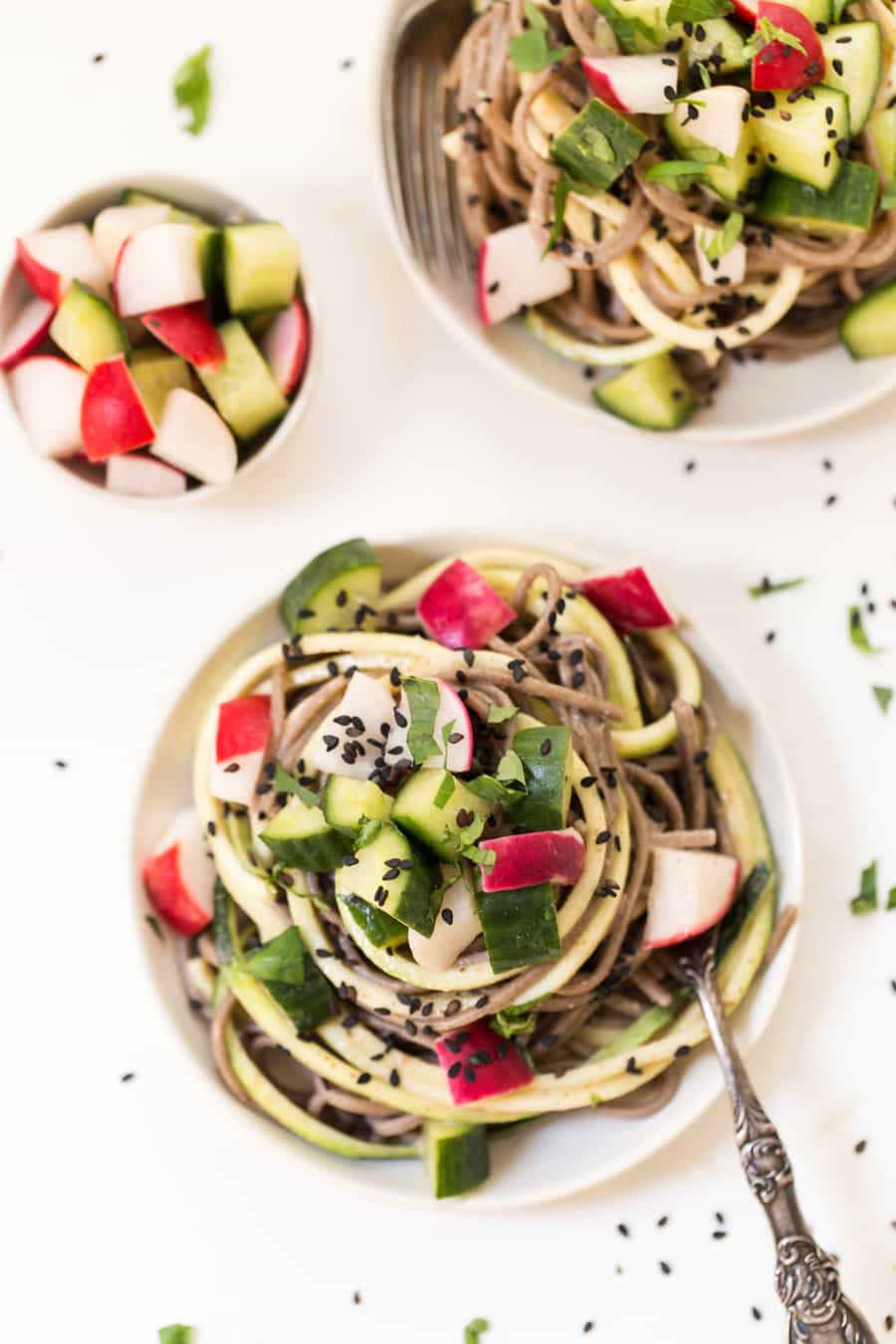 Overhead view of sesame soba noodles on plates