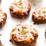 These MINI Sweet Potato Pizza Bites are topped with an amazing lentil bolognese sauce and shredded cheese!