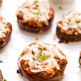 These MINI Sweet Potato Pizza Bites are topped with an amazing lentil bolognese sauce and shredded cheese!