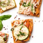 Tomato & Zucchini Quinoa Pizza -- a simple, flavorful, plant-based pizza recipe that is absolutely PERFECT for summer!