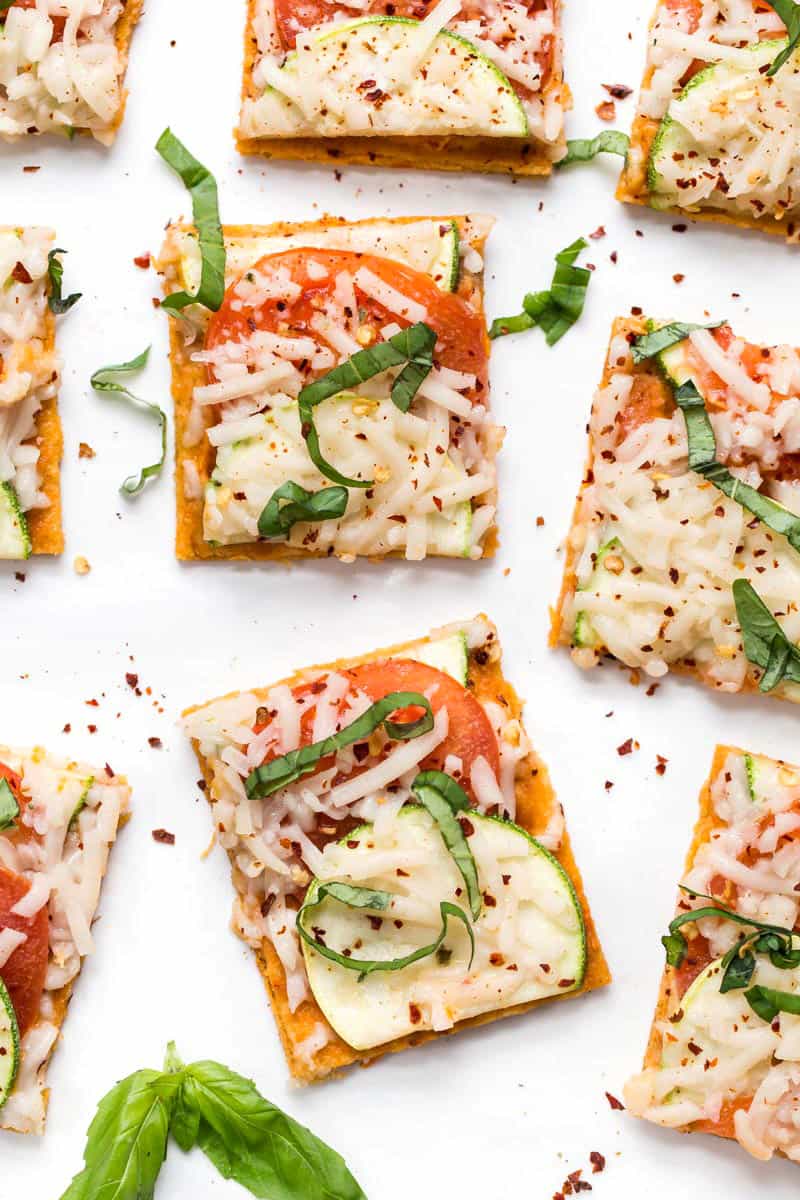 healthy quinoa pizza crust with tomato and zucchini