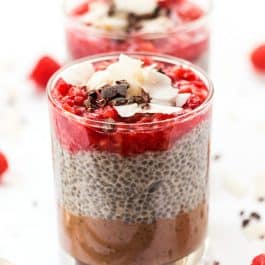 This AMAZING Layered Chia Parfaits have chocolate, chia pudding and a raspberry topping!