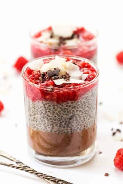 This AMAZING Layered Chia Parfaits have chocolate, chia pudding and a raspberry topping!