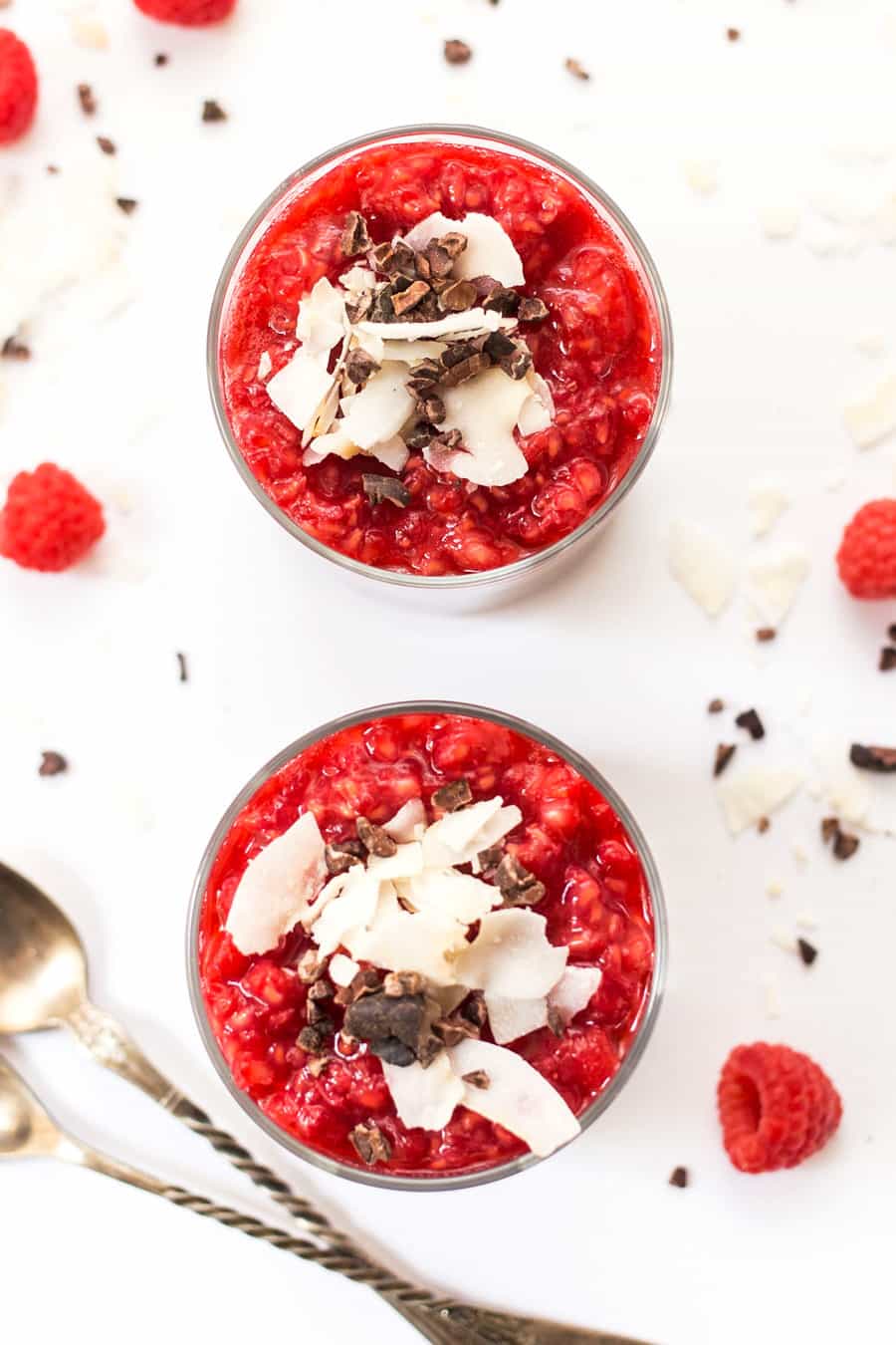 These healthy chia parfaits start with a layer of banana chocolate mousse, then a layer of chia pudding and finished off with smashed raspberries on top!