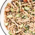 creamy mediterranean pasta salad with hummus and olives