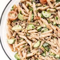 Looking for a healthy pasta salad to make? Try this Creamy Mediterranean Pasta Salad! It's made with veggies and tossed in a healthy creamy sauce!
