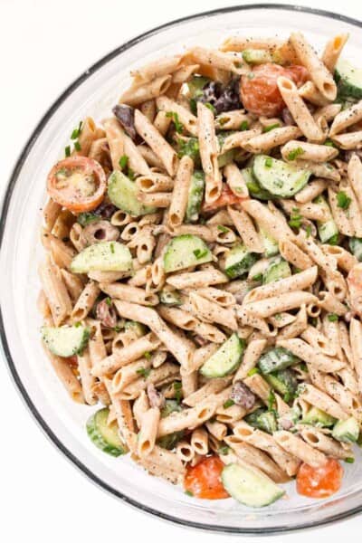 creamy mediterranean pasta salad with hummus and olives