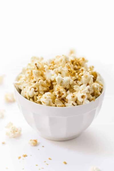 The BEST Vegan Popcorn! Made with just a few simple ingredients and packed with cheesy flavor!