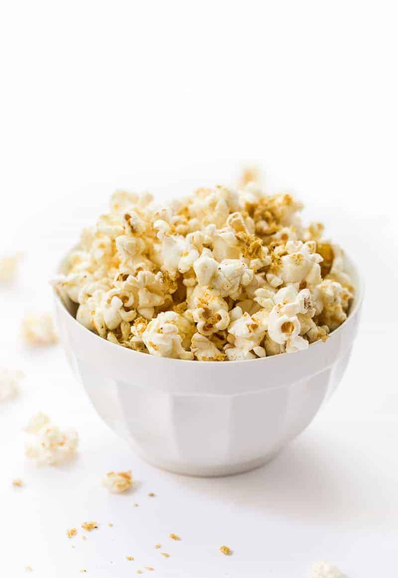 The BEST Vegan Popcorn! Made with just a few simple ingredients and packed with cheesy flavor!