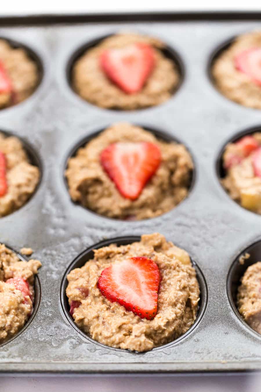 Banana Oatmeal Muffins in muffin tin ready to bake