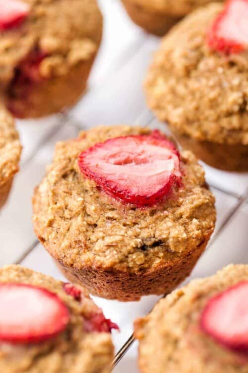 These SKINNY Strawberry Banana Oatmeal Muffins are made with out any refined sugar, eggs, oil OR dairy!