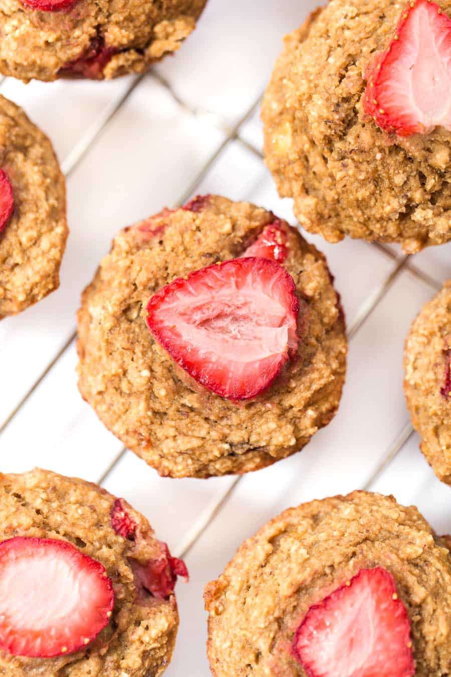 Baked Strawberry Banana Oatmeal Muffins on cooling rack