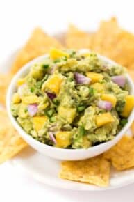 spicy mango guacamole with cilantro and onion