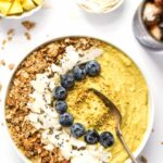 This ENERGIZING Mango Smoothie Bowl is made with fruits, veggies and superfoods to give you a natural boost of energy in the morning!