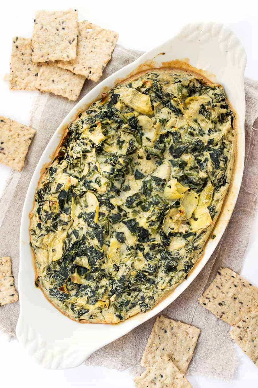The most INSANELY DELICIOUS Vegan Spinach Artichoke Dip! Less than 10 ingredients, 30 mins and tastes so cheesy!