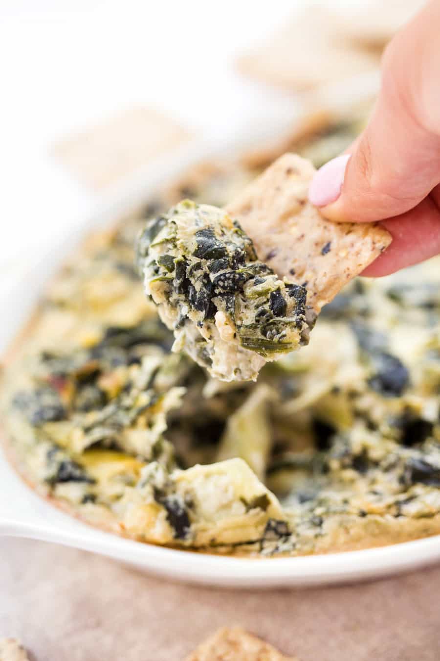 VEGAN SPINACH ARTICHOKE DIP -- made with less than 10 ingredients and ready in just about 30 minutes!