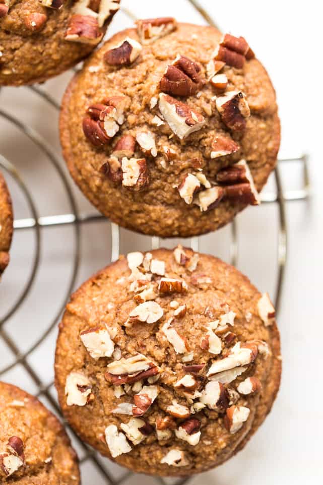 Overhead view of applesauce blender muffins on wire rack