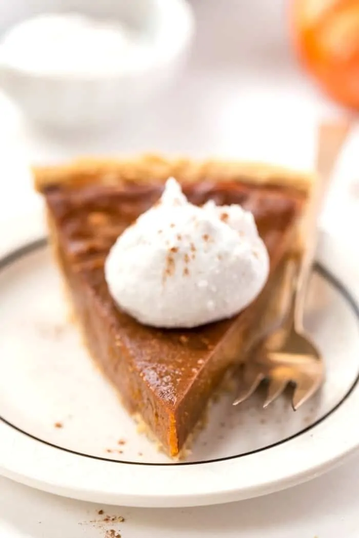 PERFECT Vegan Pumpkin Pie served in a flakey, grain-free almond flour crust!