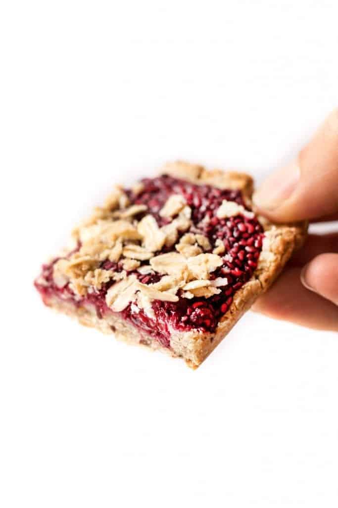 vegan raspberry oatmeal bars made with just 9 ingredients