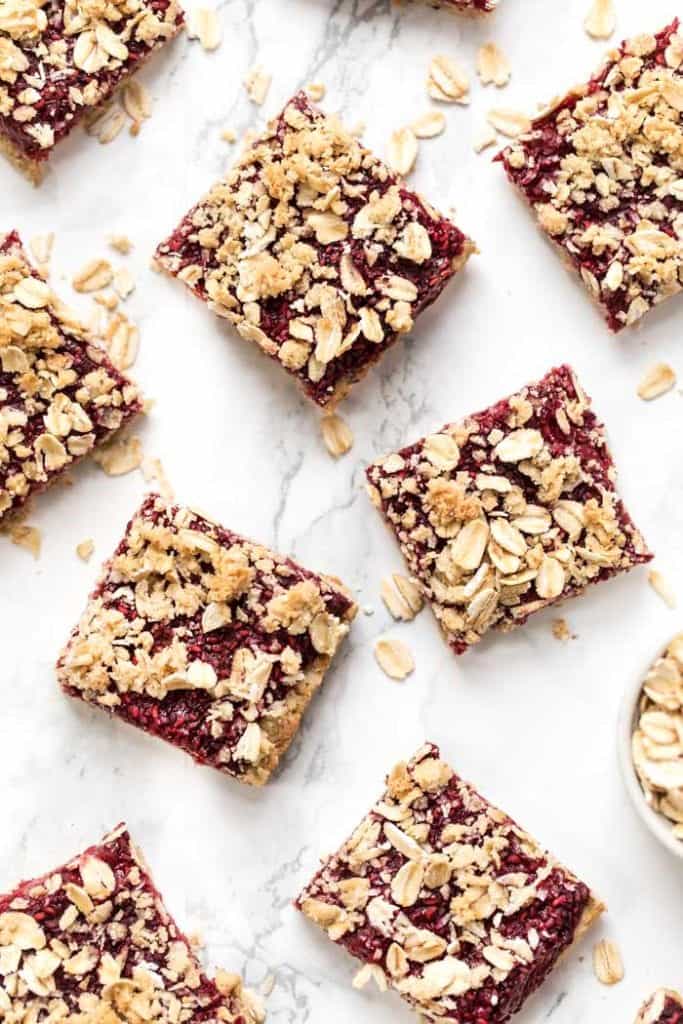 vegan raspberry oatmeal bars made with just 9 ingredients