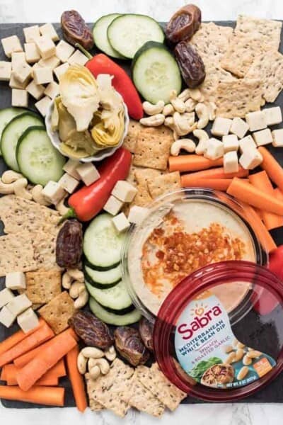 healthy vegan snack board with white bean dip