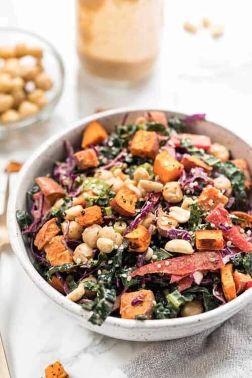 superfood kale salad with spicy thai almond butter sauce