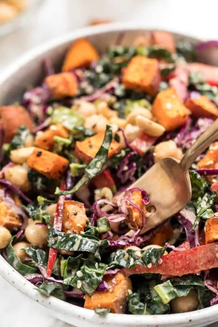 superfood kale salad with a creamy almond butter dressing