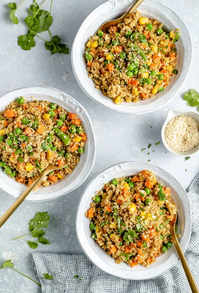 bowls of quinoa fried rice with vegetables