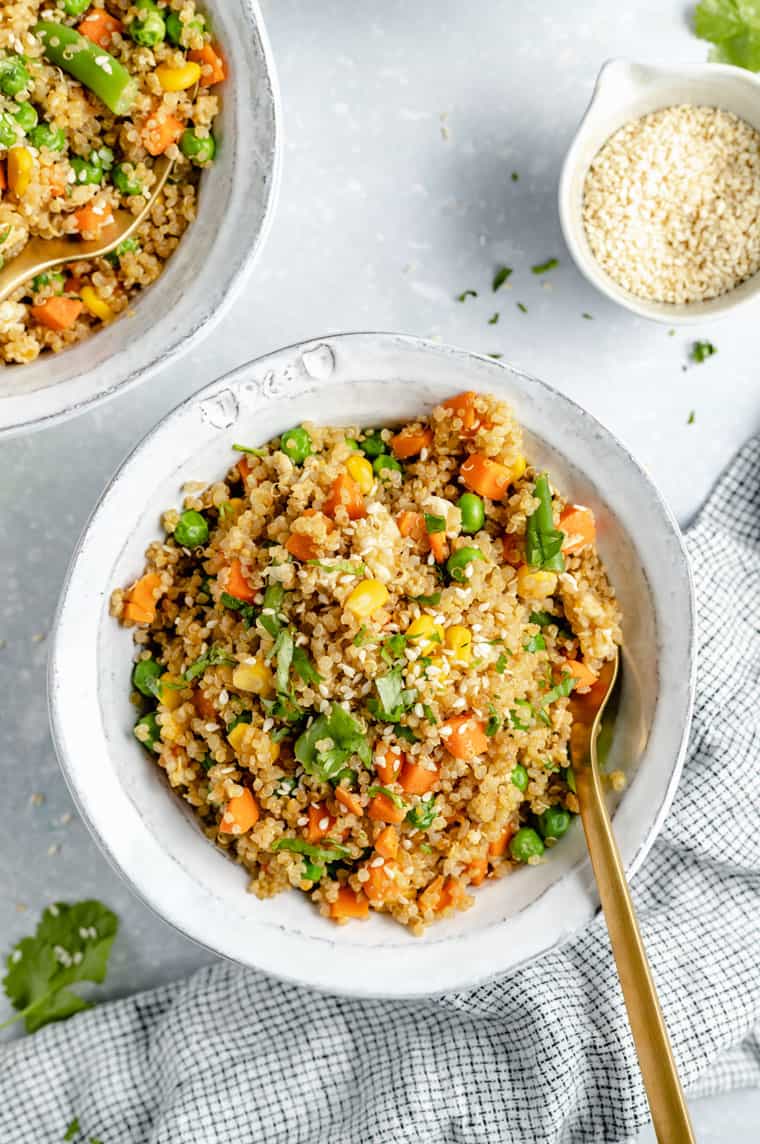 white bowl with quinoa fried rice and vegetables