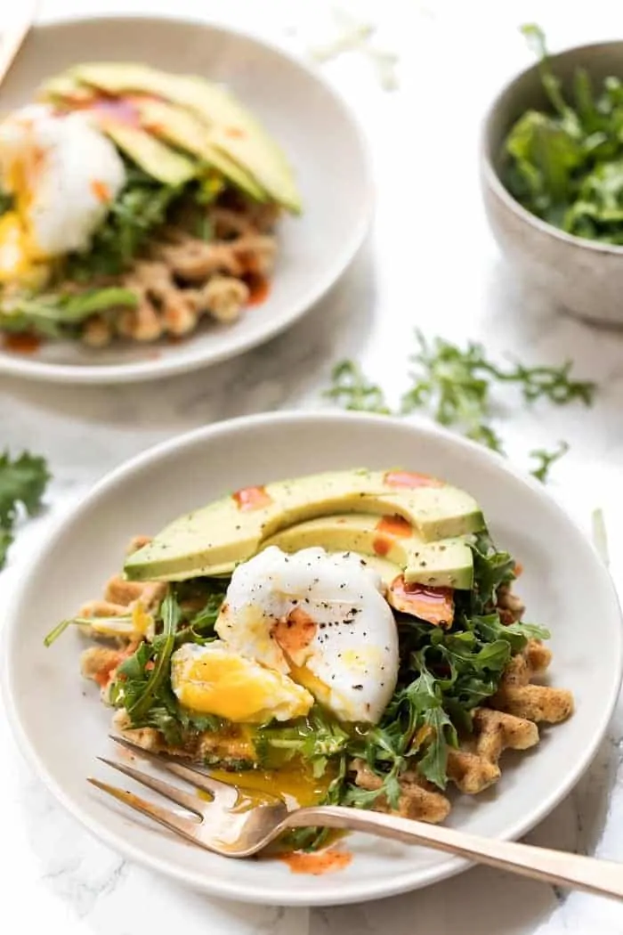 zucchini almond flour waffles with hummus and arugula