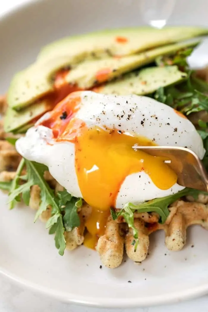gluten-free almond flour waffles with hummus and poached eggs