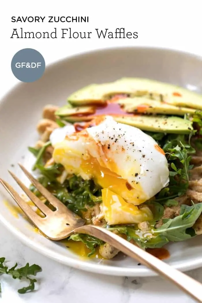 savory almond flour waffles topped with hummus and arugula