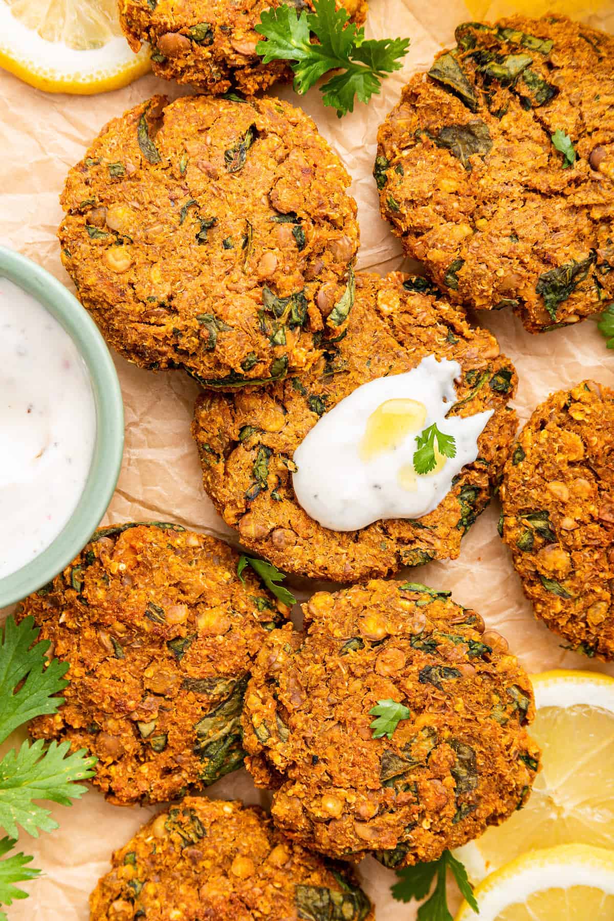 Overhead view of lentil patties with dipping sauce