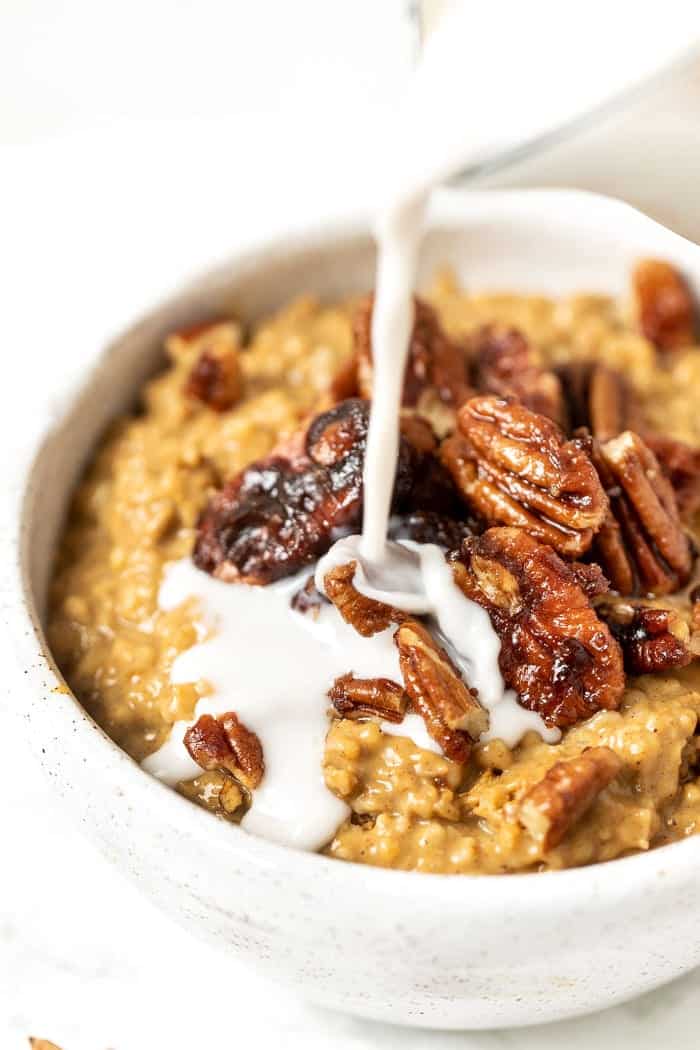 This vegan pumpkin steel cut oatmeal recipe can be made in 30 minutes, and is bursting with flavor from caramelized pecans Creamy Pumpkin Pie Oatmeal