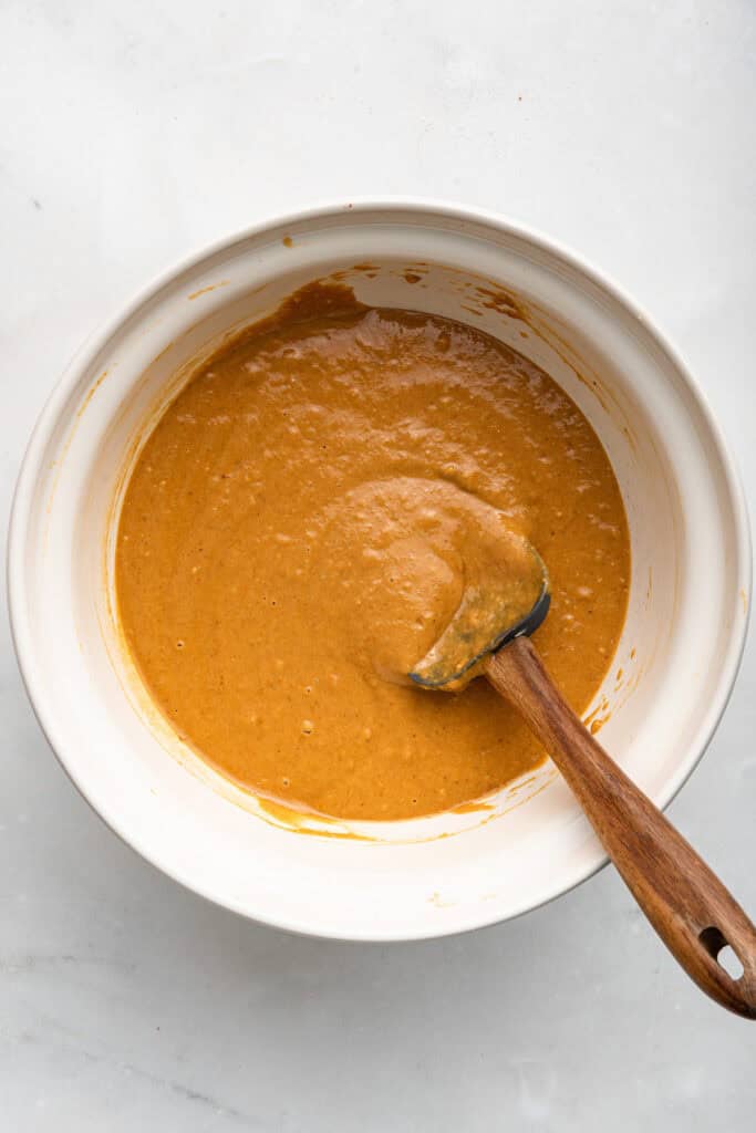 Overhead view of pumpkin coffee cake batter in bowl