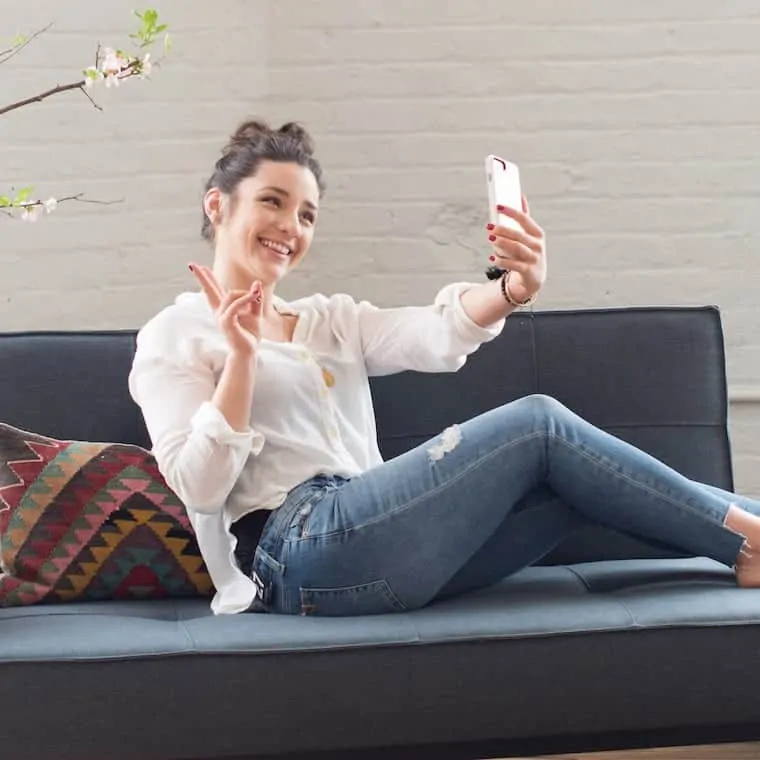 Woman Taking Selfie and Smiling