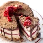 Slice of Mini No-Bake Raspberry Cheesecake being removed