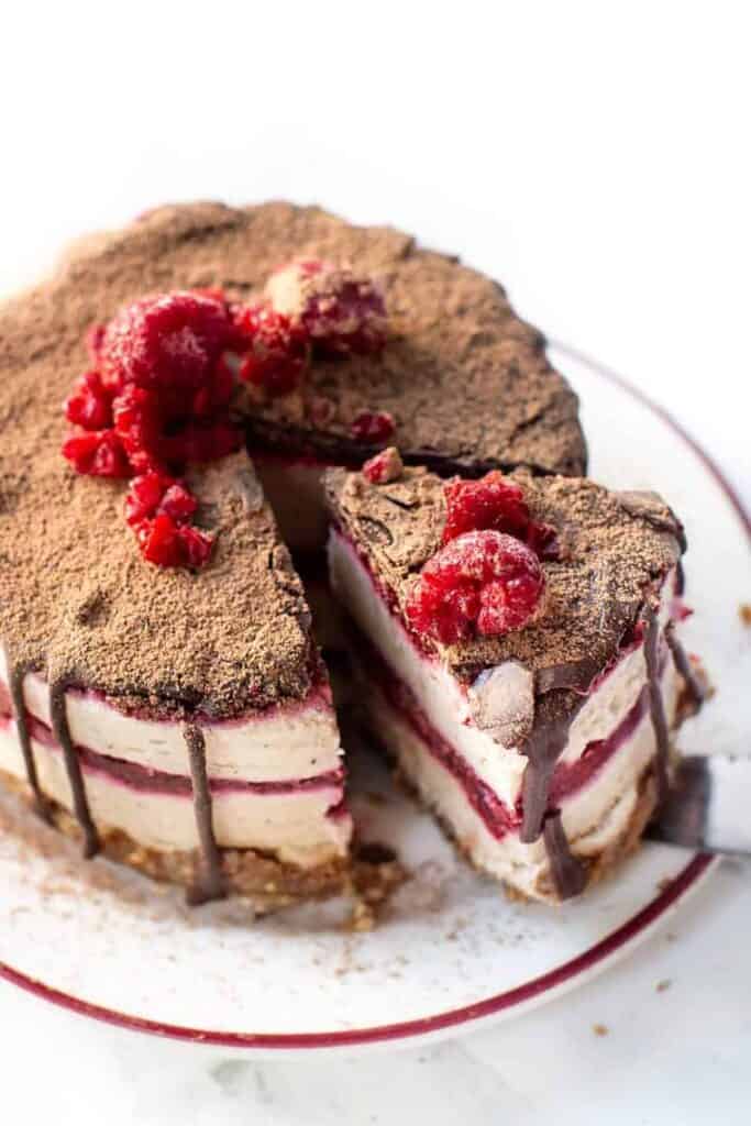 Slice of Mini No-Bake Raspberry Cheesecake being removed