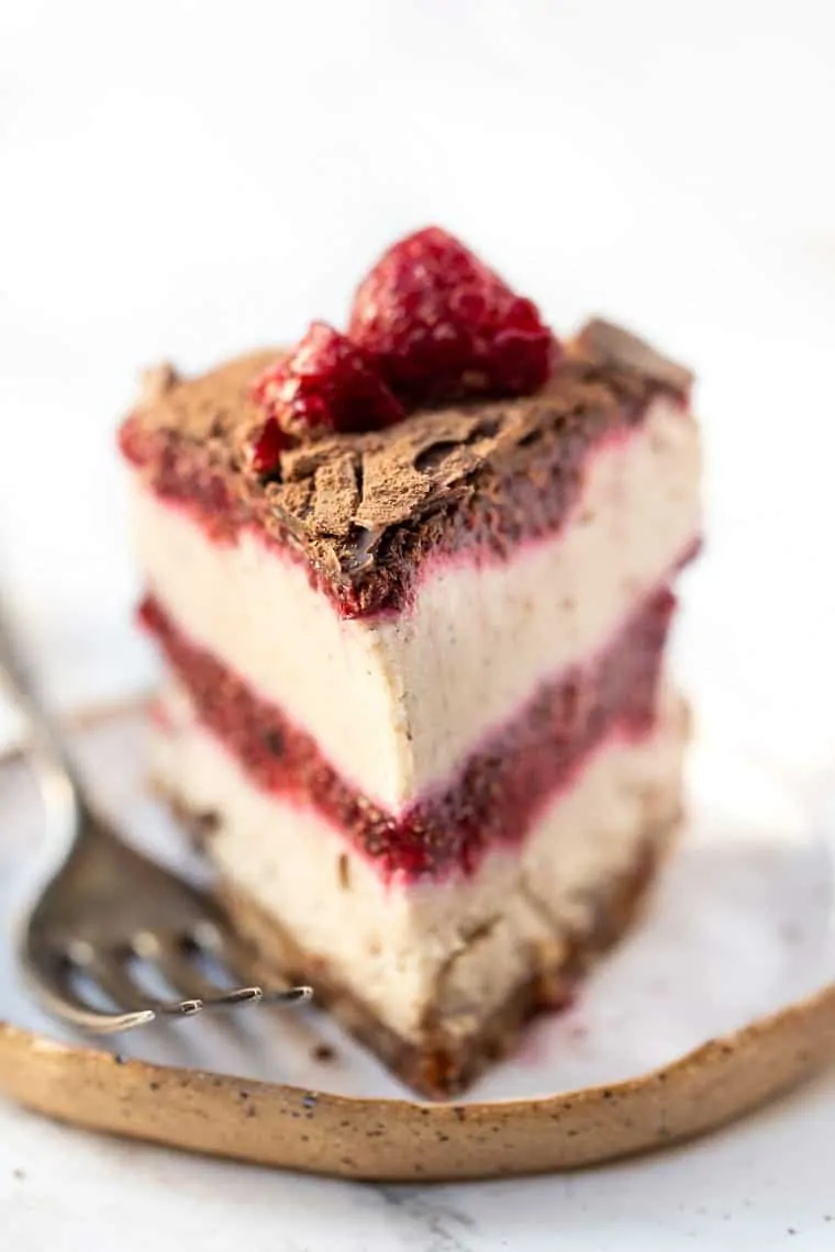 Slice of No-Bake Raspberry Cheesecake on plate