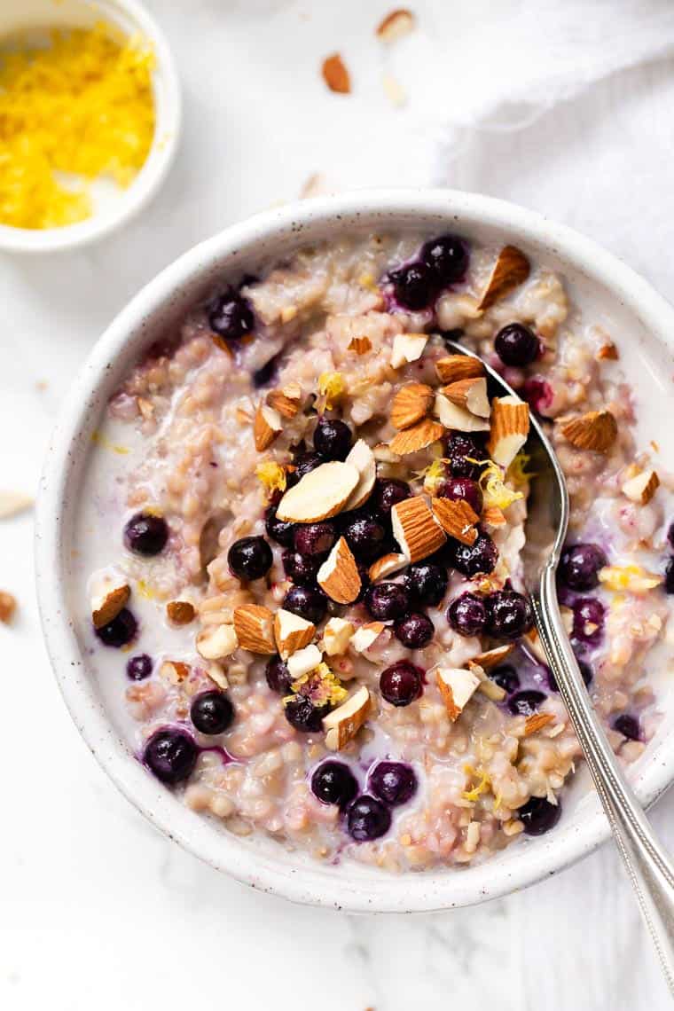Learn how to make the creamiest steel-cut oats in the Instant Pot. This easy method works every time. Plus, get 6 flavor variations! Lemon Blueberry Steel Cut Oats