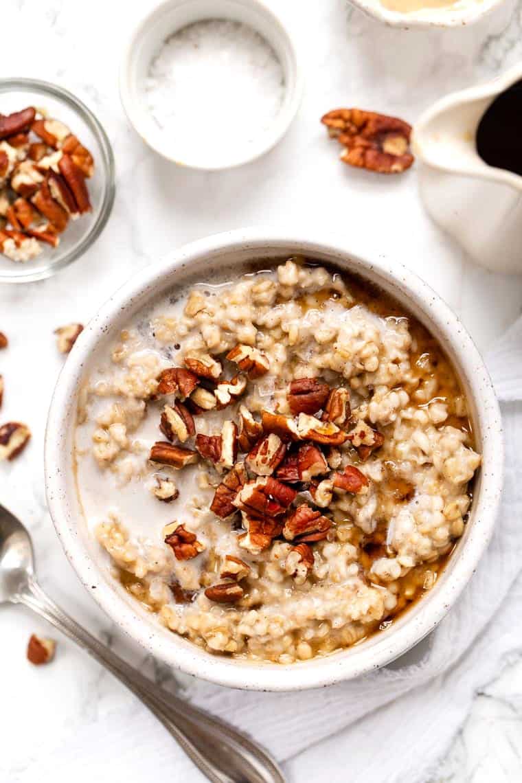 Learn how to make the creamiest steel-cut oats in the Instant Pot. This easy method works every time. Plus, get 6 flavor variations! Maple Steel Cut Oats