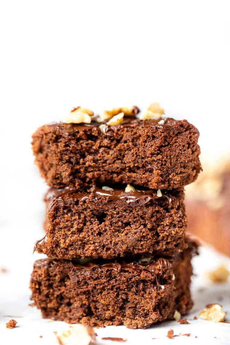 Three stacked almond butter brownies