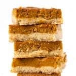 A stack of gluten-free pumpkin pie bars.