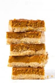 A stack of gluten-free pumpkin pie bars.
