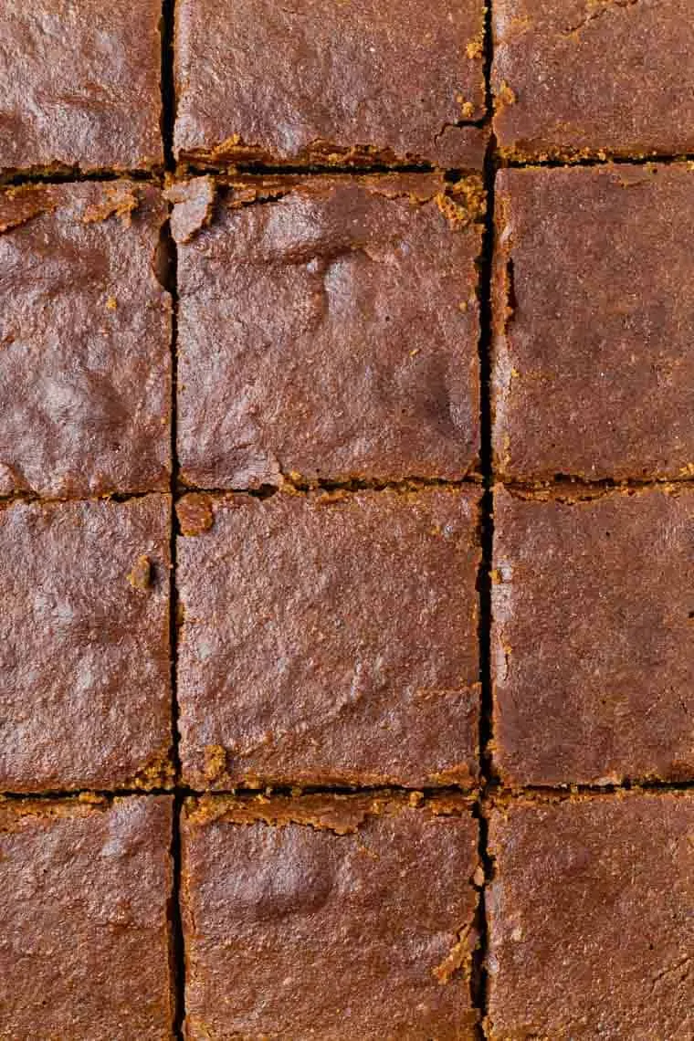 Overhead view of sliced gingerbread cake