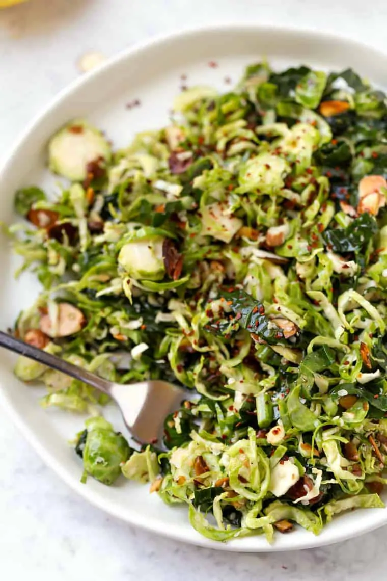 Easy Shredded Brussels Sprout Salad on plate with fork